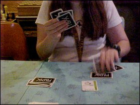 When Heather's looking for cards to play, she smacks the cards down on the table in record speed!