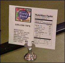 Today at the far end of Southern Bistro, next to the Vegan Corner, which you'll learn about a little later, we have Sirloin Tips, made and served right here in front of you. Another enhancement to the new D-Hall is the new Nutrition facts cards. Previously, the cards showed the food pyramid and the facts, rather than the formal "Nutrition Facts" panel.