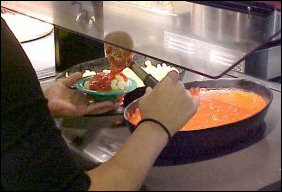 And of course, pasta and tomato sauce, complete with grated cheese beside it.