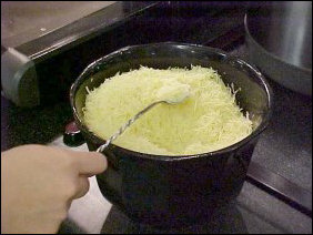 And of course, pasta and tomato sauce, complete with grated cheese beside it.