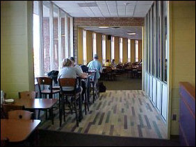 This area right here is an actual physical expansion of D-Hall, over the entrance lobby. Three new tables that each seat four are here, and it also serves as a new walkway.