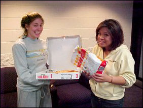 And later, Callie and Joanne enjoy pizza and potato chips.