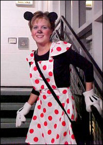 In the stairwell, I encountered none other than Minnie Mouse, complete with those trademark cartoon-character gloves.