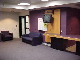 Welcome to the TV lounge! Color TV, now with 70+ channels, provided we have a coaxial cable hooked to the TV, adequate seating, and a view of the Harrisonburg skyline.
