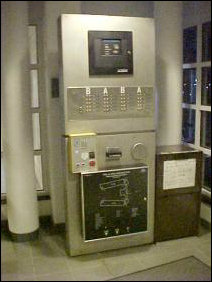 Right off the lobby is the entranceway, and inside that is one of the "nerve centers" of this building. On this panel is the card-access in the center along with the "emergency" phone, the Fire Alarm Control Panel (FACP) at the top, and the alarm annunciator at the bottom. Below the FACP is the controls for the rescue assistance buttons.