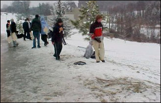 People sledding used nearly everything - linoleum, trash bags, mattresses, seat cushions, trays... you name it.