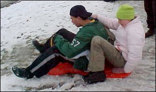 Meanwhile, Raleigh and Lindsay gave the sled another go. This time, fortunately, they didn't hit the tree...