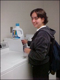 Christina knocks off a load of laundry before settling in for a Halloween study session.