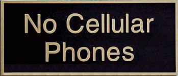 Next to the door and above my room number sign is my "No Cellular Phones" sign. Many people have asked me why I have it, and some have hazarded a guess. Two guesses that people made were that they thought it was related to a medical condition, and others thought it was because I had sensitive computer stuff in here that a cell phone would disrupt. Turns out both of those are wrong - I just put it up as a matter of enforcing common courtesy when visiting me. I've had people come in to see me, and then their hip starts ringing. All of a sudden, I'm nothing, and I've got to wait for them to finish the phone call.