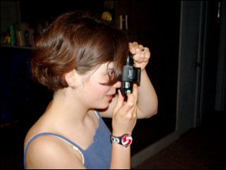 Everyone had a camera to capture their own memories of Smith Mountain Lake. Here, Maggie prepares to capture a moment on film.