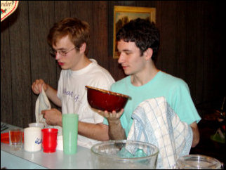 Meanwhile, Spencer and Josh take a moment to help with the dishes.