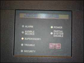 Interestingly enough, the alarm system was showing a "Supervisory" condition after the front panel was reconnected, and the screen, instead of the usual date, time, and location, showed what was going on in Supervisory mode. Click the images above to get a better look at what the panel was showing on the screen.