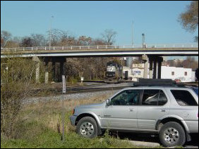 Continuing along Chesapeake Avenue, we find more industrial area, and then passed over the railroad tracks, and under the Talmage R. Cooley bridge back to Grace Street.