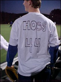 One of our players painted a number and "HOSS" on the back of his shirt.  It went over very well with everyone, and others' decorating their shirt-backs was encouraged.