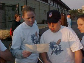 Teresa and Johnny review the lineup before we began to bat.