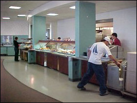 The buffet in this room serves hamburgers, hot dogs, chili, French fries, onion rings, nachos (including cheese), and the like. It's a good stop for lunch!