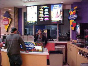 I'm usually a hard-core alarm hanger-arounder, but I'm sorry, it was COLD. So I went to the convenience store at the Festival, and found Jim ordering a Freshens Smoothie.