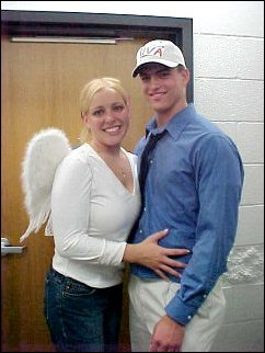 Along with Andrew, also a "UVA prep", Dana dresses up as an angel.