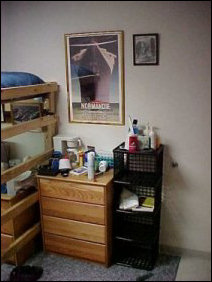 And this is my dresser, as well as storage space.  Note so many things that couldn't find a home got a home in Potomac... last year, that Normandie poster was sitting, in its frame, on the floor for most of the second semester.  Now, it hangs from the wall, like it should.