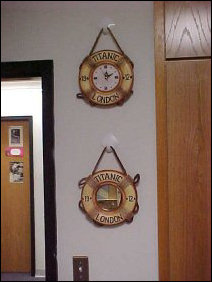 As if there's not enough clocks and things, here's two more for ya... I picked these up at Virginia Beach in August, and so by the door is a clock and a mirror.  Made to look like Titanic life rings.  I don't really use the clock (I have a clock on my computer that I use), but I do shave in that little mirror.  Note one inaccuracy: Titanic's home port is not London - it's Liverpool.