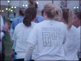 The Tri-Sigma sisters definitely had a field day with their shirts!  Besides the ΣΣΣ letters, they put numbers and various words on the back of their shirts.  In the picture at left, above the large 88 is the word "GONADS".  At right, above the 04, "FONTANA" is written in block letters.