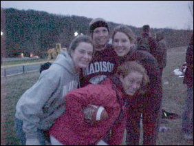 These Tri-Sigma sisters have an extra football, and are holding it in support of the team.