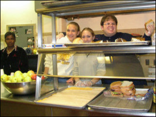 Food service is in action, as Leigh, Mary, and myself strike a pose for the camera. The sequence was tray, plate, soup, sandwich, cheese, dessert, etc. Only complaint: the little plastic gloves didn't fit very well.