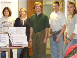 Catherine, Nicole, Spencer, Mark, and Leigh strike a pose with the pizza that the residents of Sojourner House and ourselves devoured like it was going out of style.